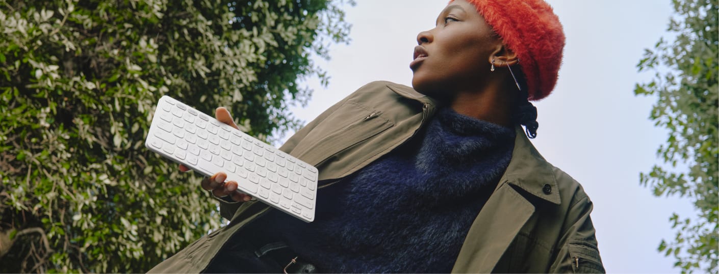 Women holding Keys to go 2 Keyboard